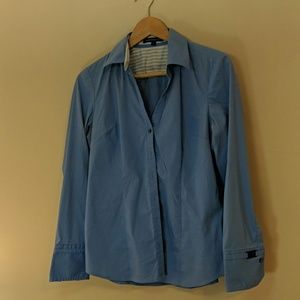 Express button up with faux cufflinks. Stretchy.